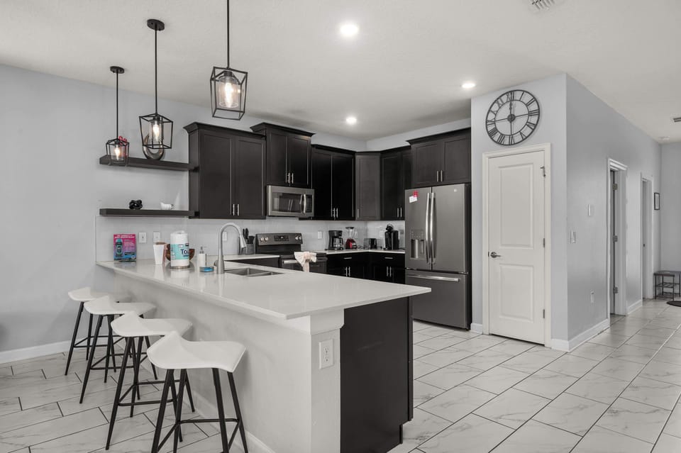 Large kitchen with all major appliances and fully stocked with dining and cook ware. Plus Keurig, drip coffee maker, blender and toaster.