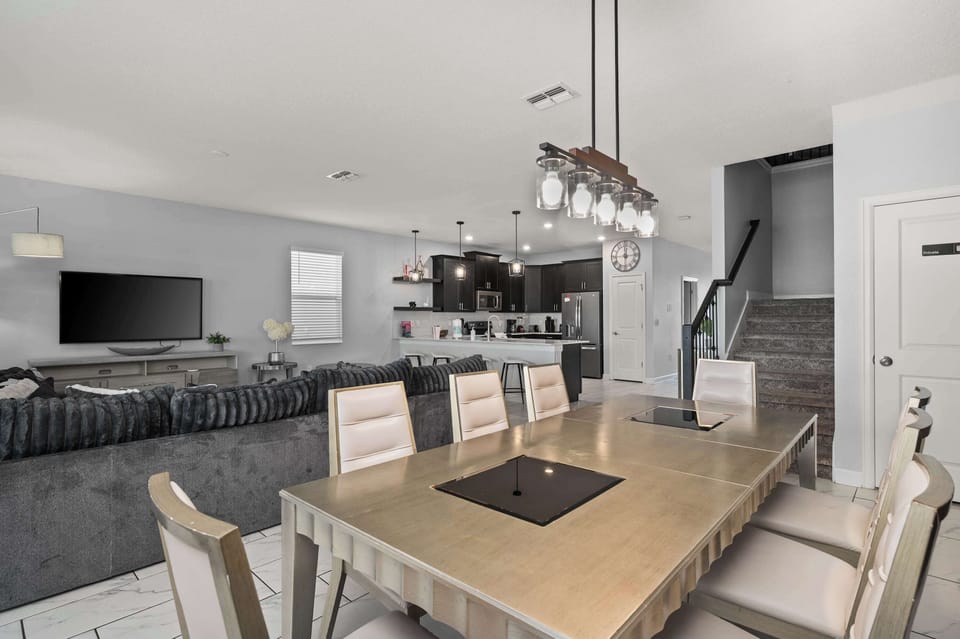 The beautiful and modern open floor plan connects the downstairs living room, dining room and kitchen, providing plenty of open space for everyone to be together!  