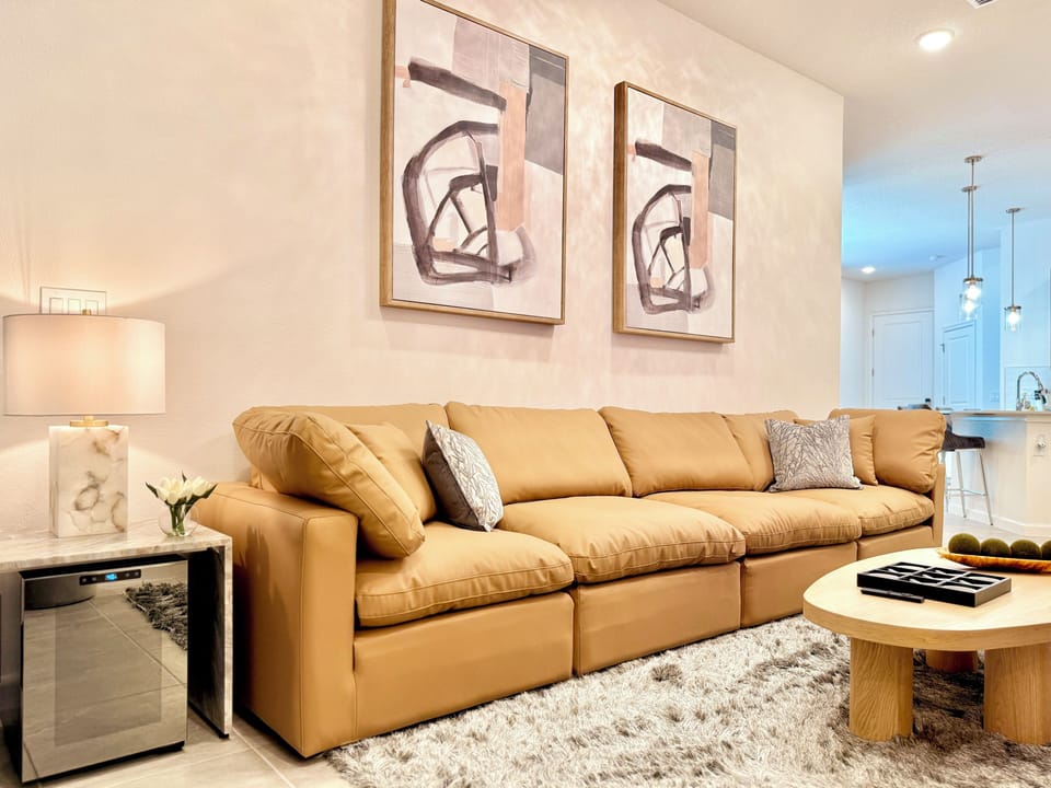 Bright living room with cozy sofas – perfect for relaxing nights.