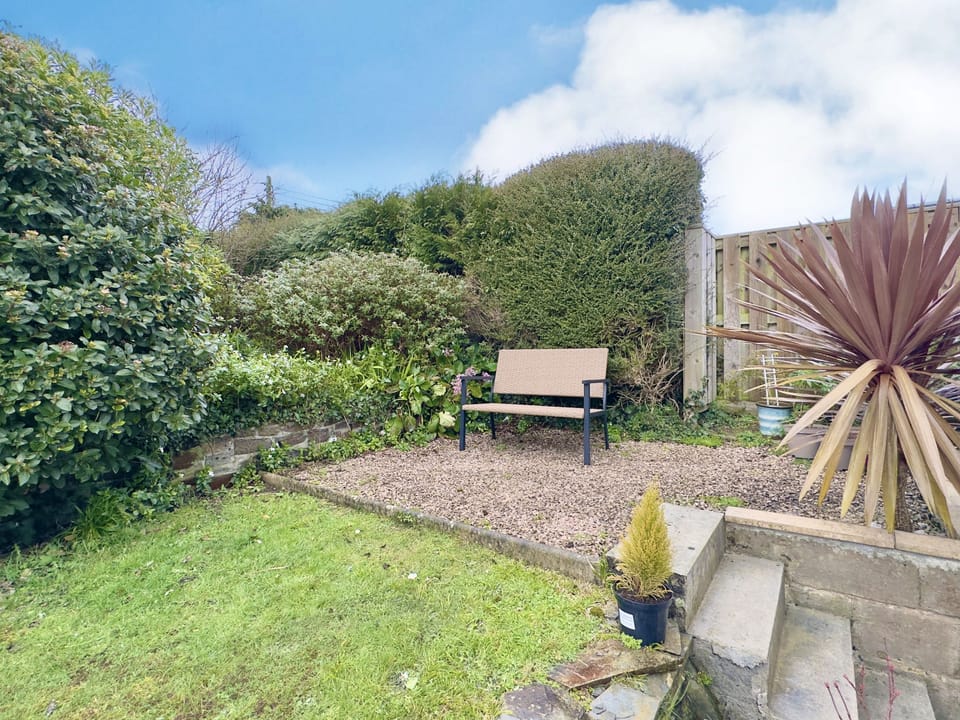 Bench in the garden of Curlews, 36 Egerton Road Holiday Cottage, Padstow, North Cornwall