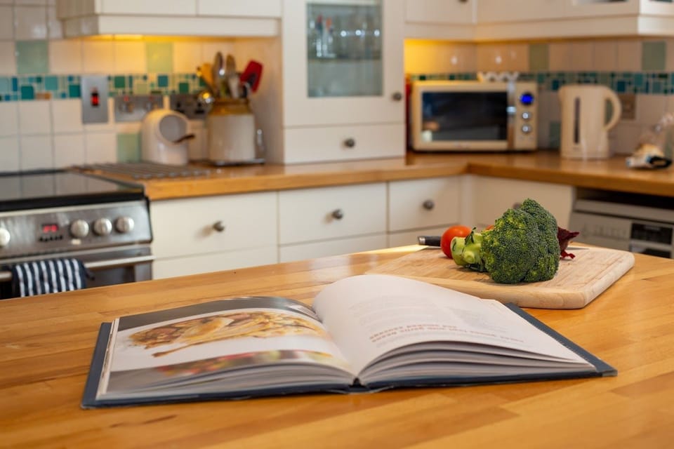 Cook book on worktop in Polcarrek Holiday Cottage, Padstow North Cornwall