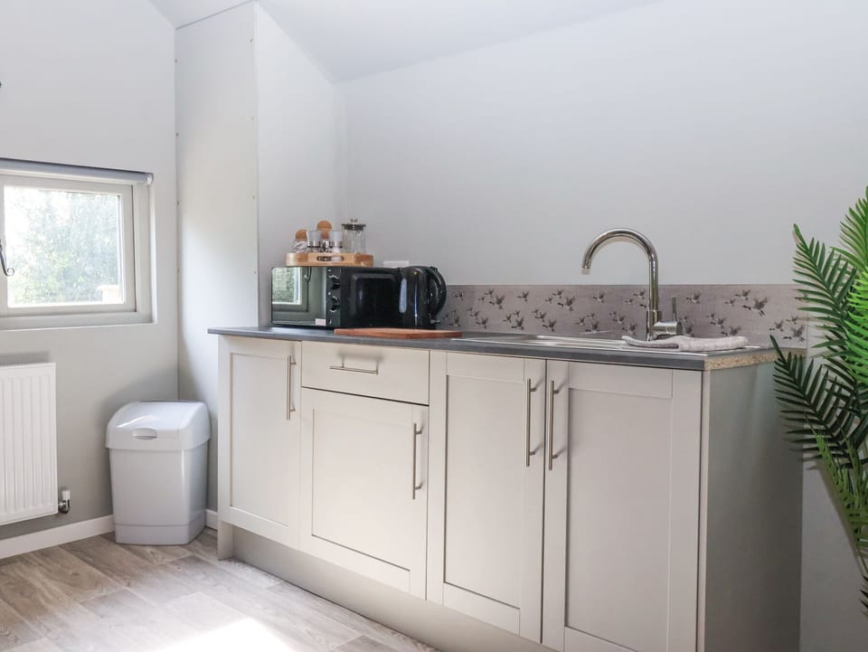 Fridge, toaster, cookware/dishes/utensils