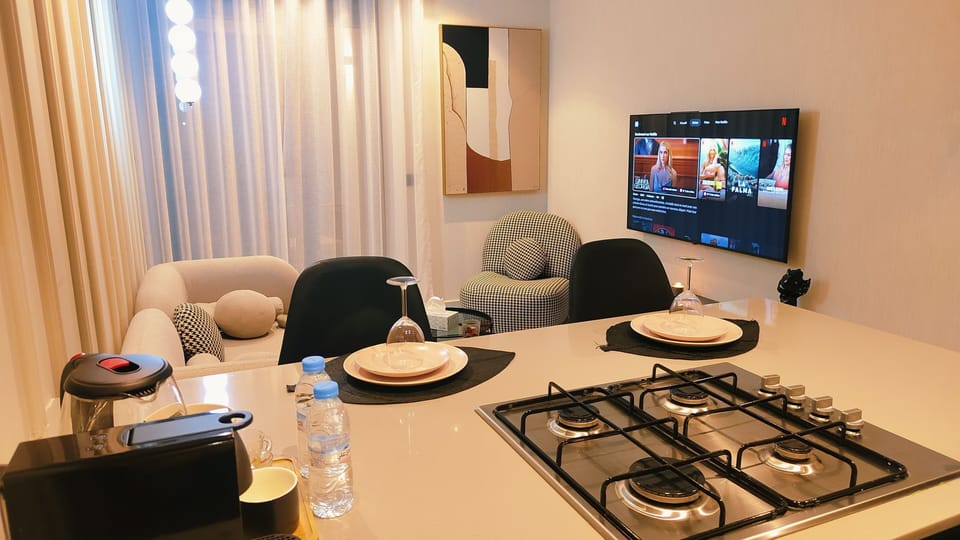 Deluxe Condo | Private kitchen | Full-size fridge, microwave, oven, stovetop