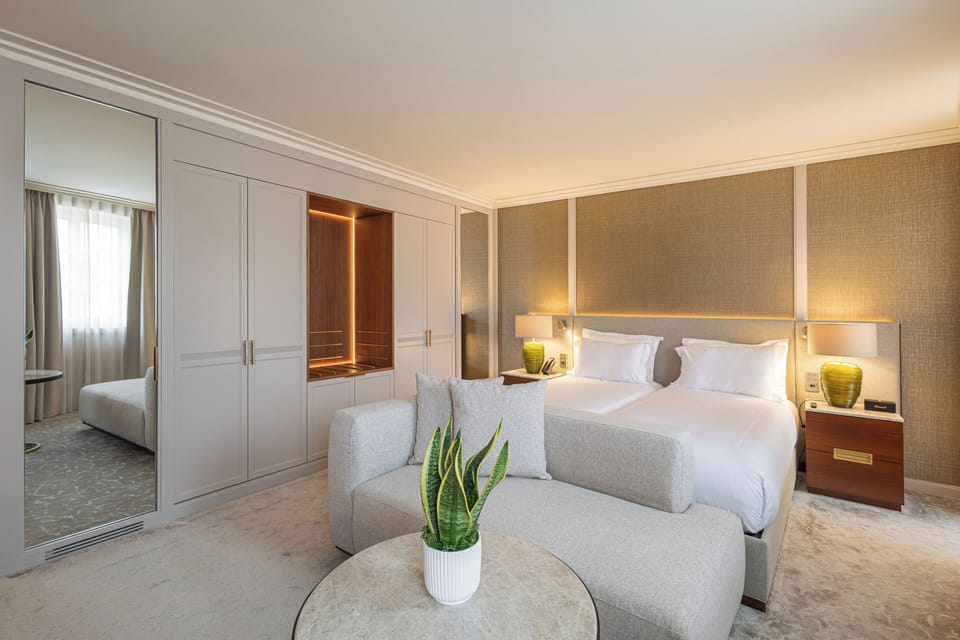 Panoramic Room, River View | Minibar, in-room safe, desk, blackout drapes