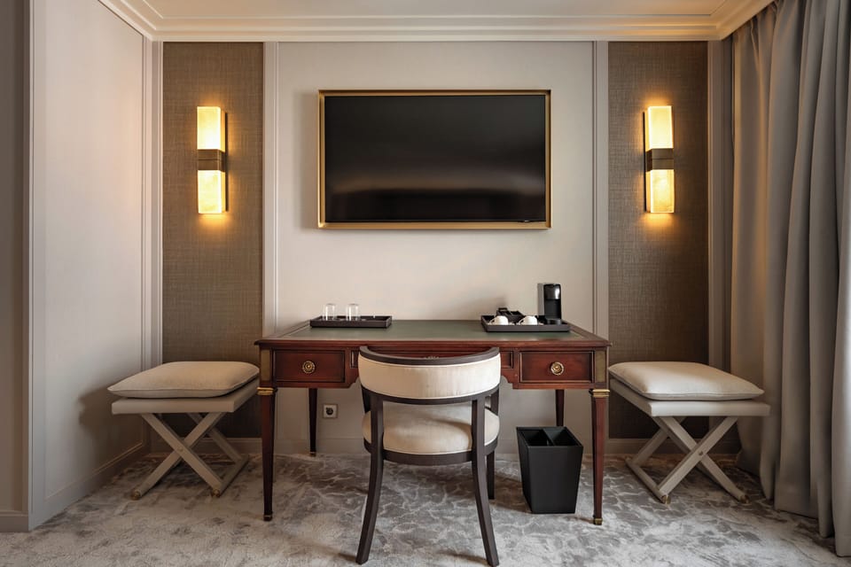Prestige Garden View Room | Minibar, in-room safe, desk, blackout drapes
