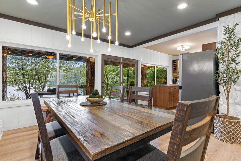 Open Concept Living Area with Vaulted Ceilings and Modern Lighting