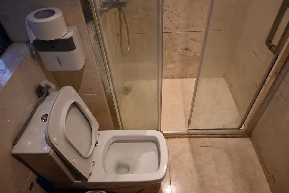 Quadruple Room, Men only, Balcony, City View | Desk, free WiFi, bed sheets