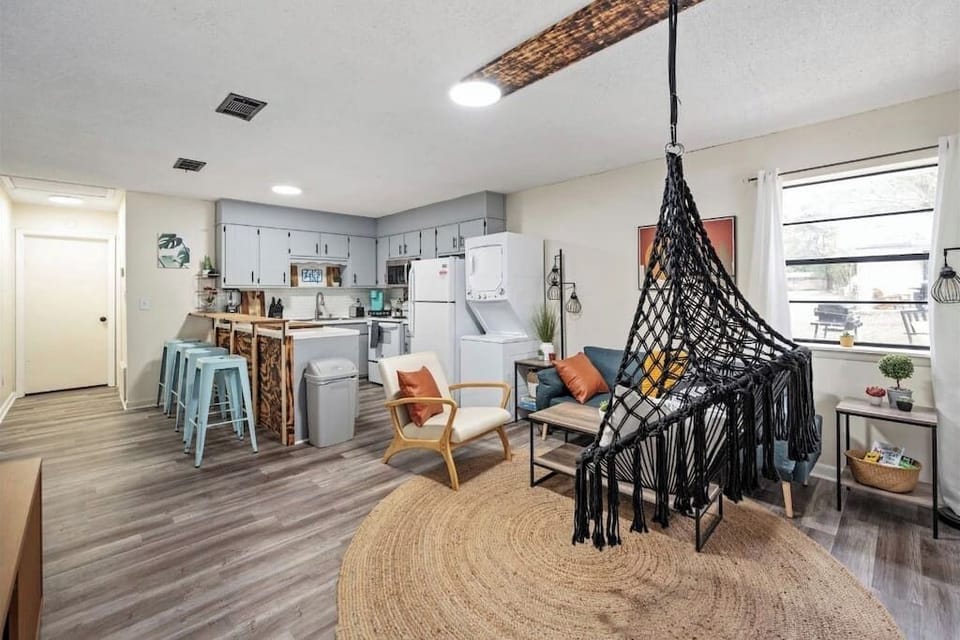 Bright open living space w/ comfy seating & seamless flow into the kitchen area