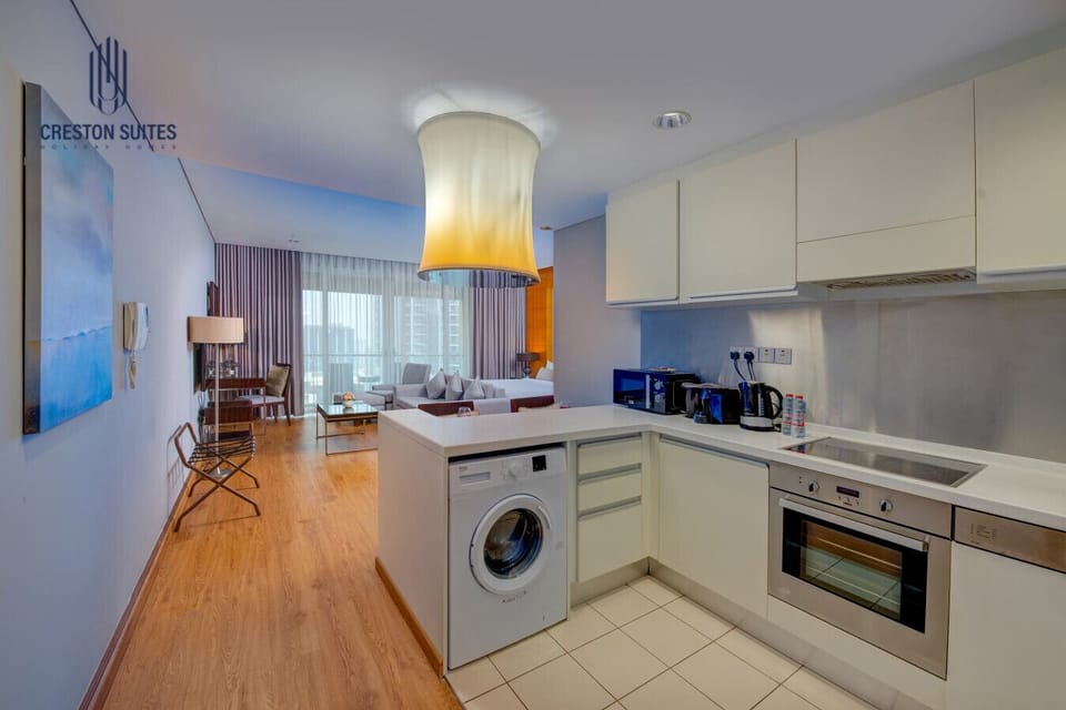 The kitchen and dining area layout and furnishings may vary slightly between rooms, yet each offers a stylish, comfortable, and well-appointed setting for your stay