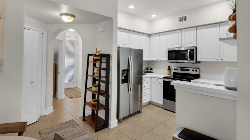 Condo, Multiple Beds, Balcony, Garden View (The Village Unit 626) | Private kitchen | Fridge, microwave, oven, stovetop