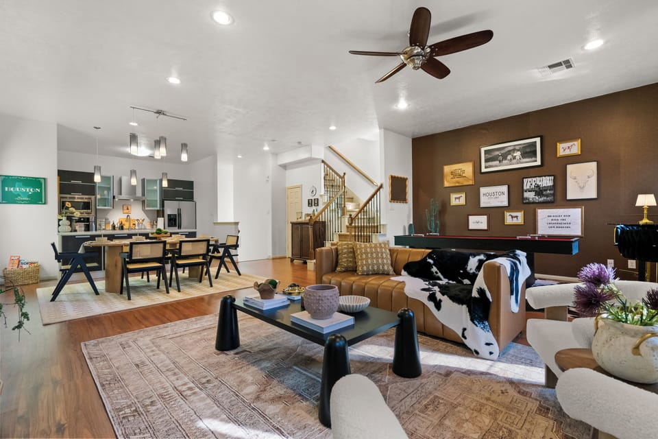 An open living room that flows seamlessly into the kitchen