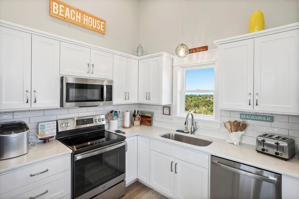 The Kitchen with modern appliances is perfect for whipping up a delicious vacation meal.
