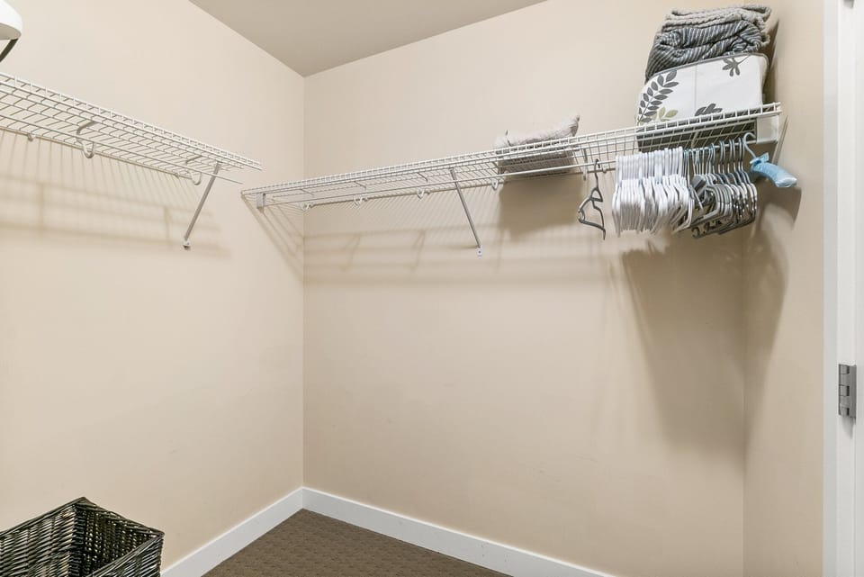 Walk in closet off primary bedroom