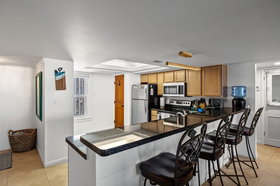 Fully equipped kitchen with pots, pans, dishware and glassware to prepare your favorite home cooked meals