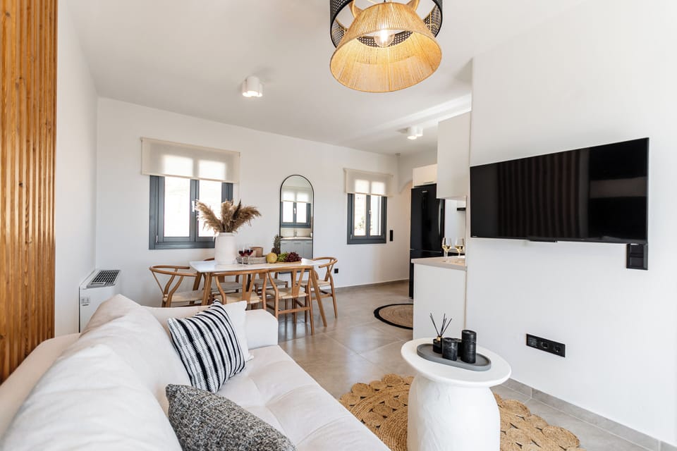 Villa, City View | Living area | 42-inch Smart TV with cable channels