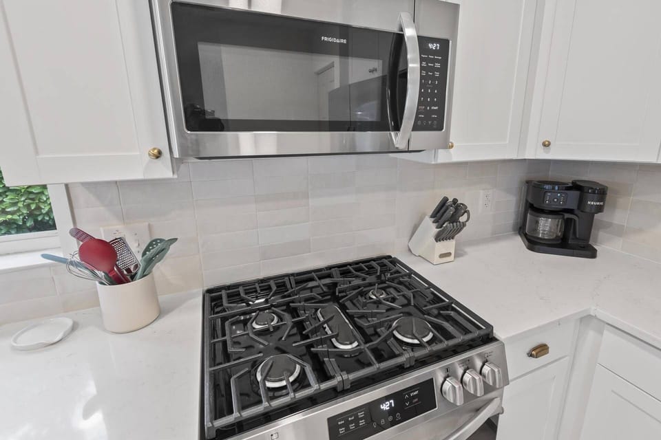Fully stocked kitchen with all the essentials, including a gas stove—ideal for preparing everything from quick breakfasts to full family dinners.