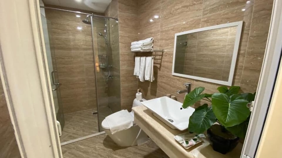 Rainfall showerhead, bathrobes, slippers, towels