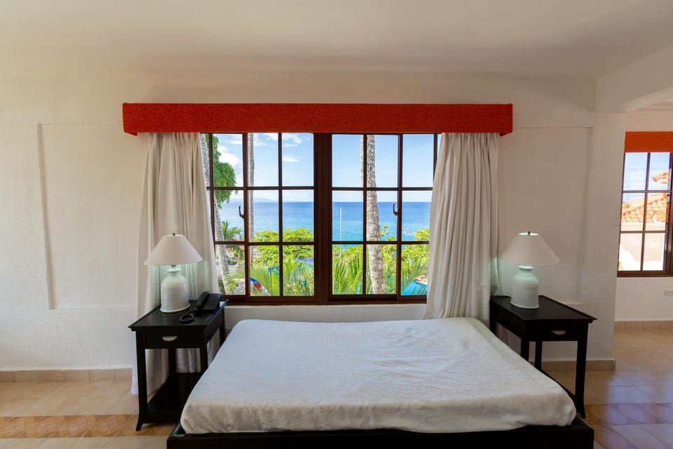 Suite, Multiple Beds | In-room safe, individually decorated, desk, laptop workspace