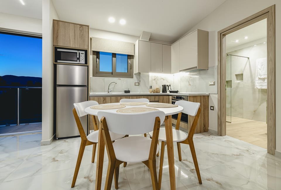 Suite, 1 Bedroom | Private kitchen | Fridge, microwave, oven, stovetop