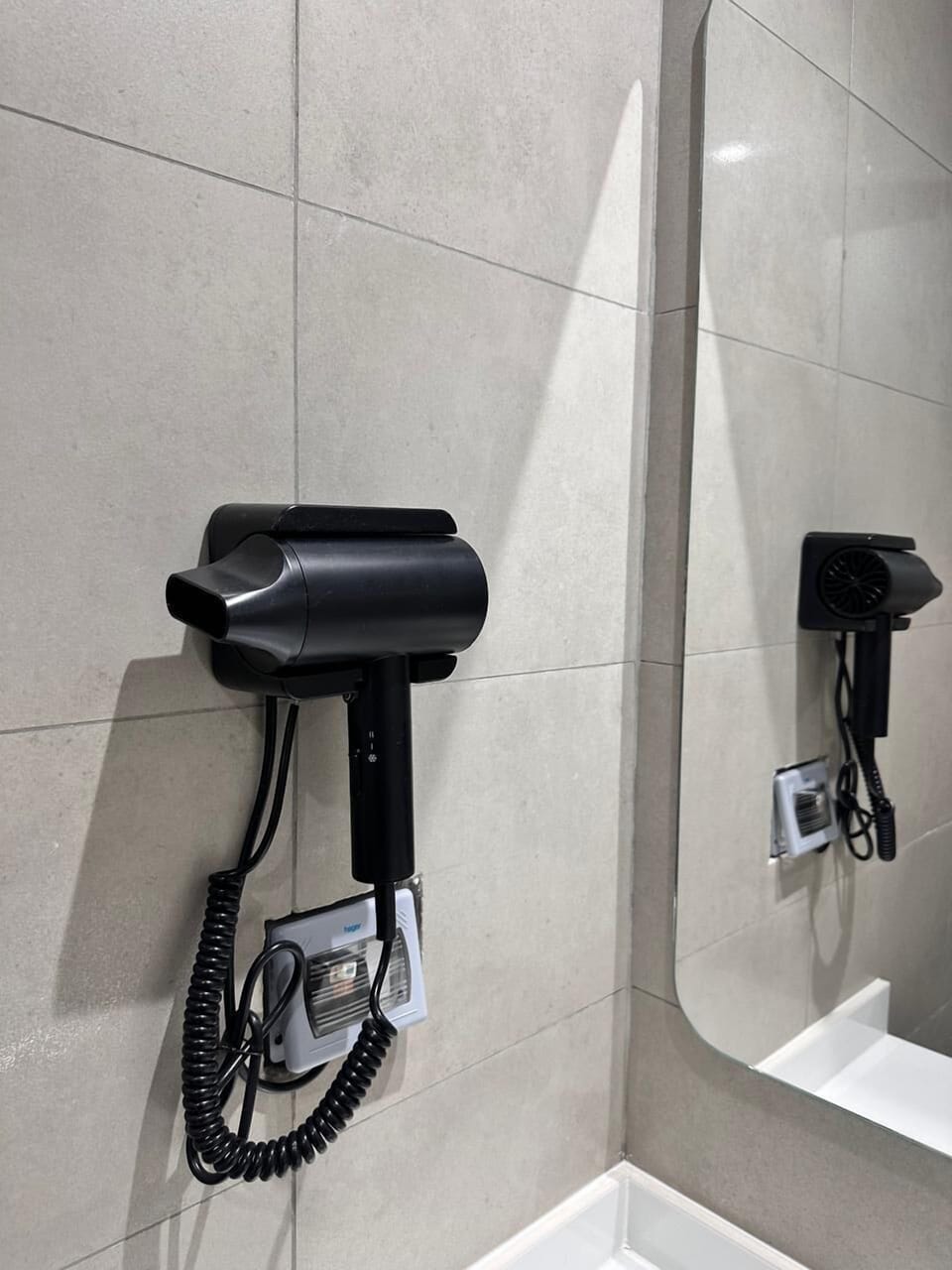 Shower, free toiletries, hair dryer, slippers
