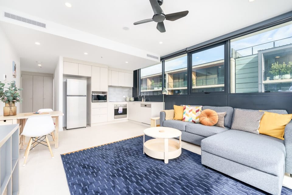 Feel at home in this inviting living room, where soft seating and a cosy atmosphere make it easy to unwind and relax.