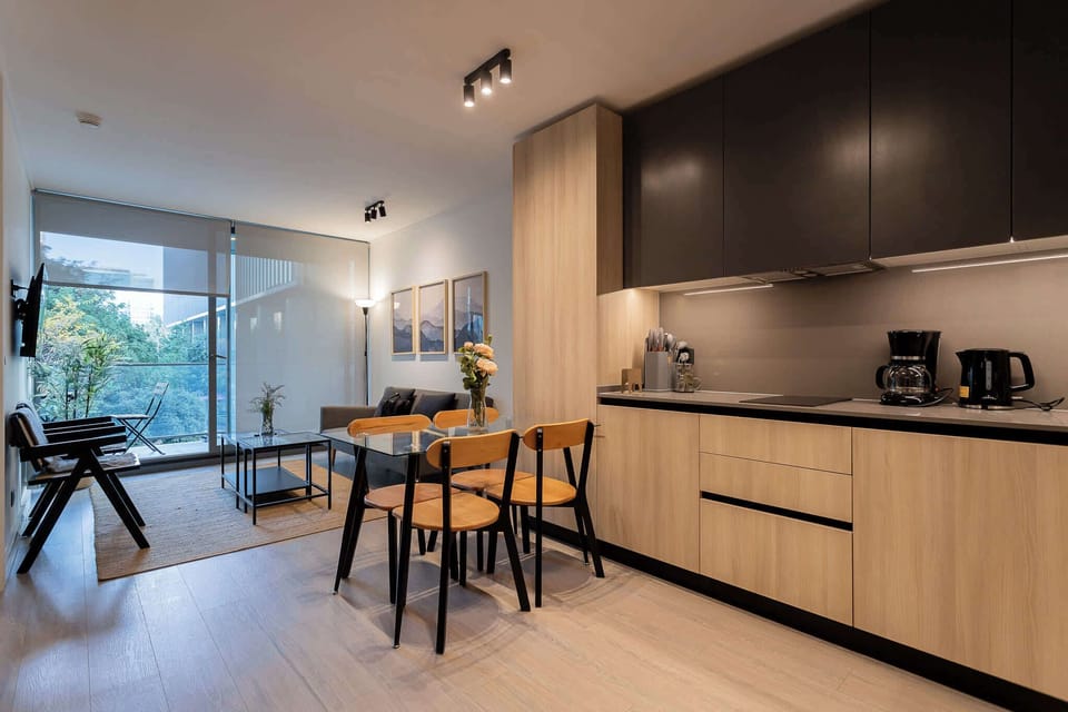 Experience modern living in this stylish kitchen and dining area, flooded with natural light and equipped for your culinary adventures.