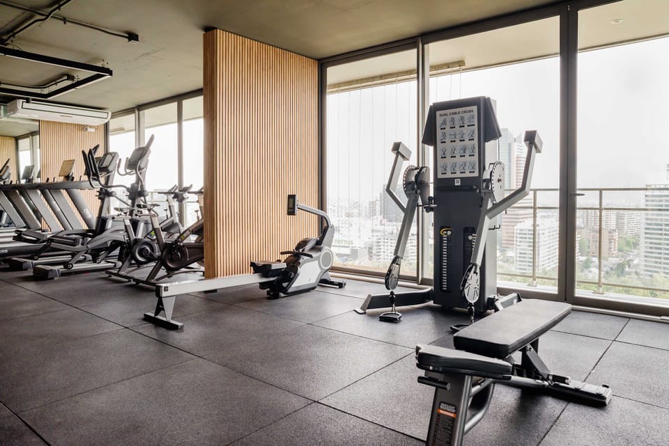 Stay fit with access to a modern gym featuring top-notch equipment and stunning city views.