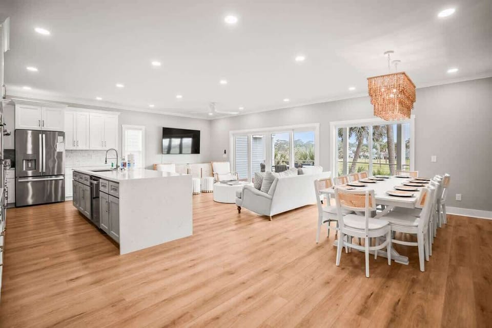 Modern kitchen with open concept dining and living room