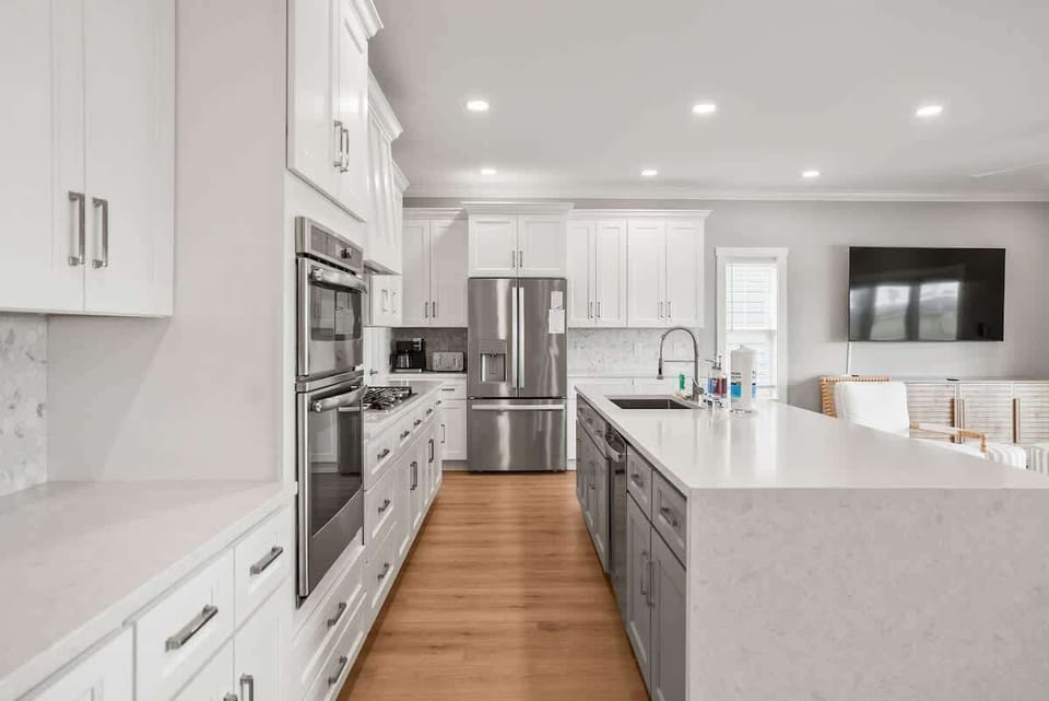 Modern kitchen with open concept dining and living room