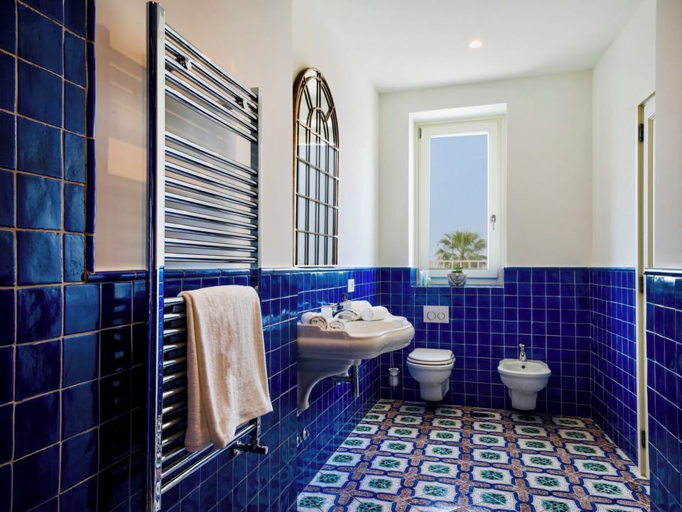 Deluxe Double or Twin Room, Sea View | Bathroom | Hair dryer, towels, soap, shampoo
