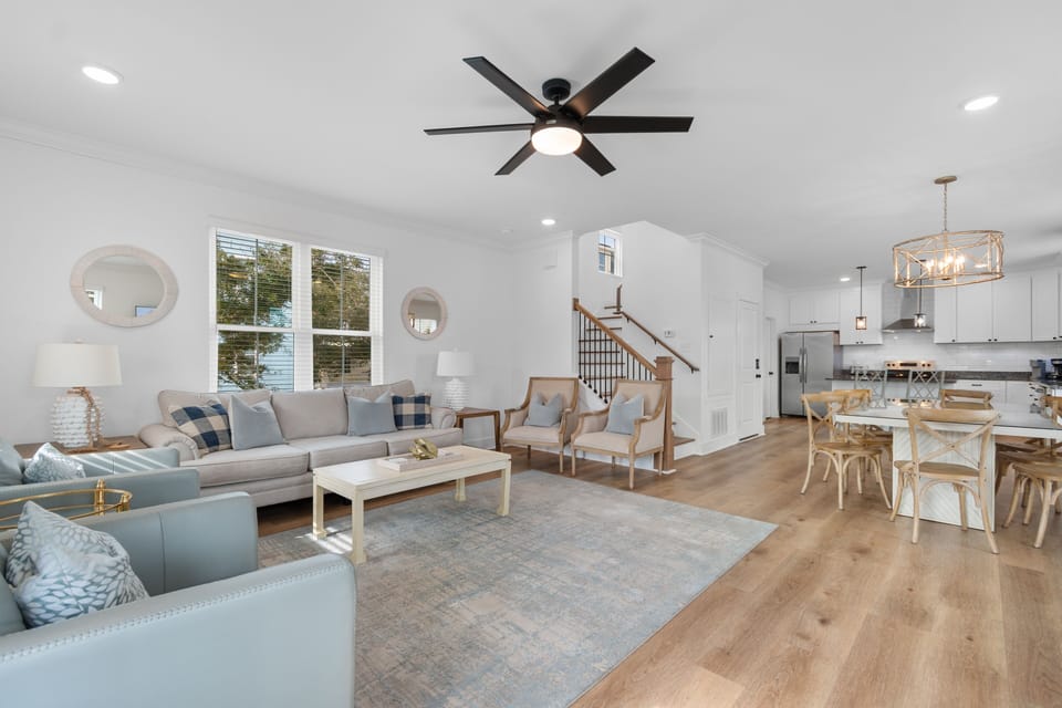 Unwind in this bright open living space where coastal comfort meets modern style, perfect for gathering with your group.