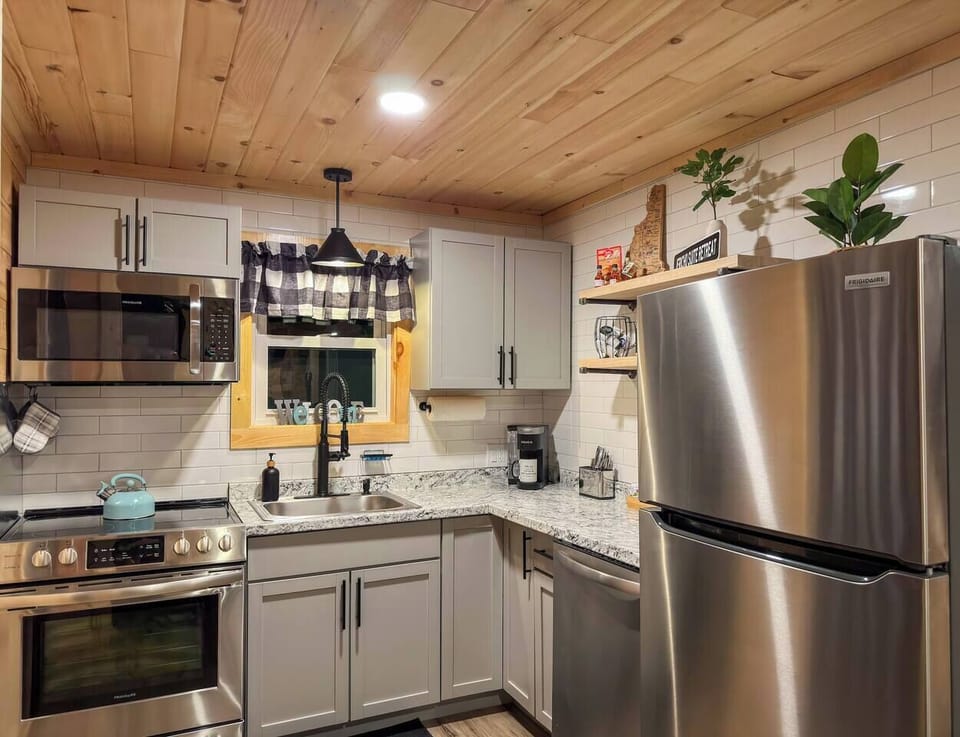 Cook up memories in our fully-equipped kitchen! From morning coffee to gourmet dinners, everything you need is at your fingertips. 