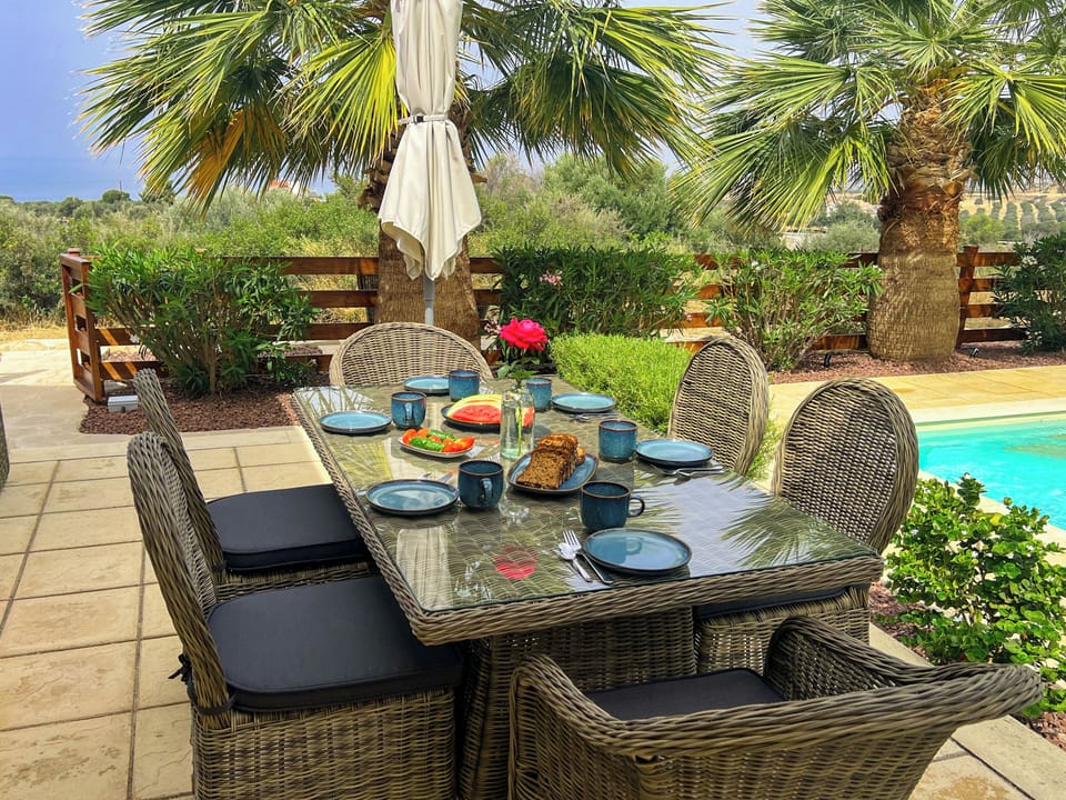 Dine outdoors on the patio while enjoying the views - perfect for family meals.