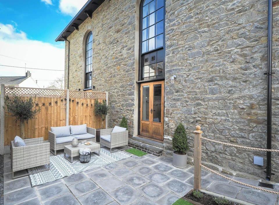 Garden with paving slabs and outside furniture