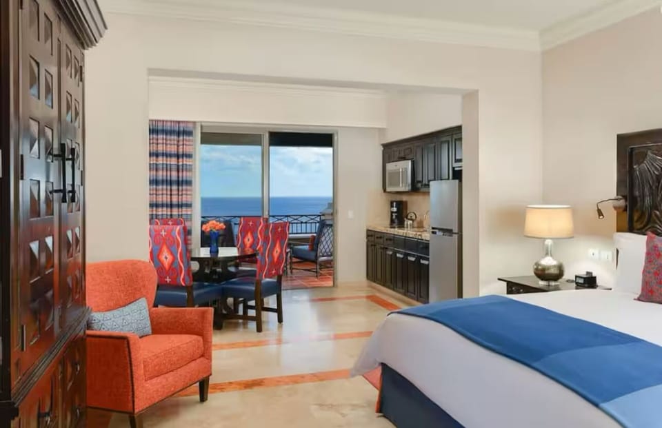 Deluxe Suite, Beach View | 1 bedroom, desk, laptop workspace, free WiFi