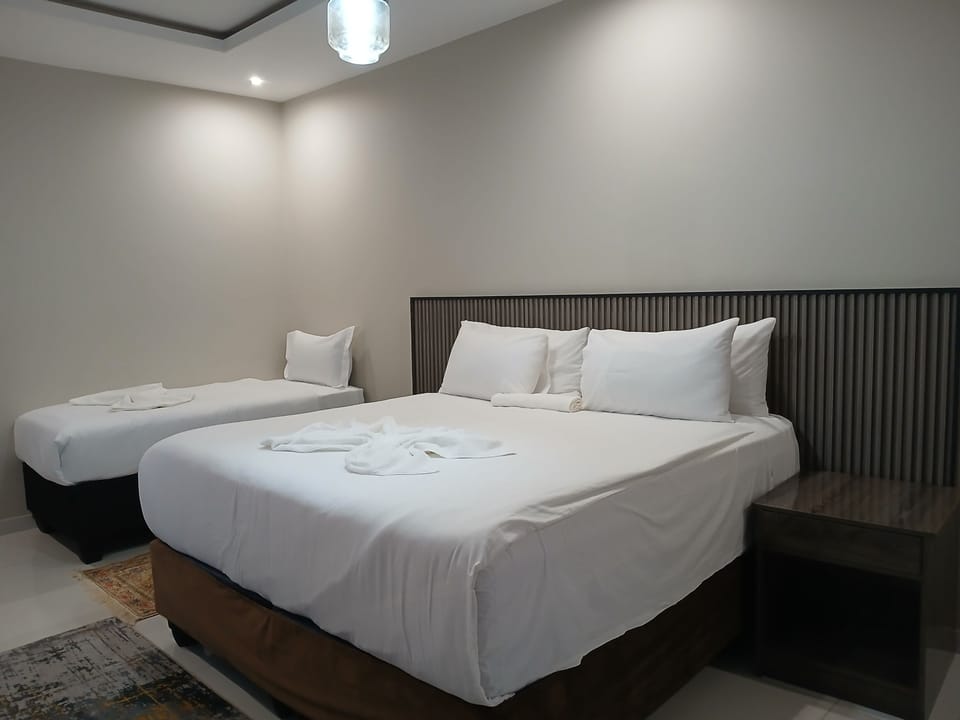 Family Double Room, Pool View | Desk, laptop workspace, iron/ironing board, WiFi (free)