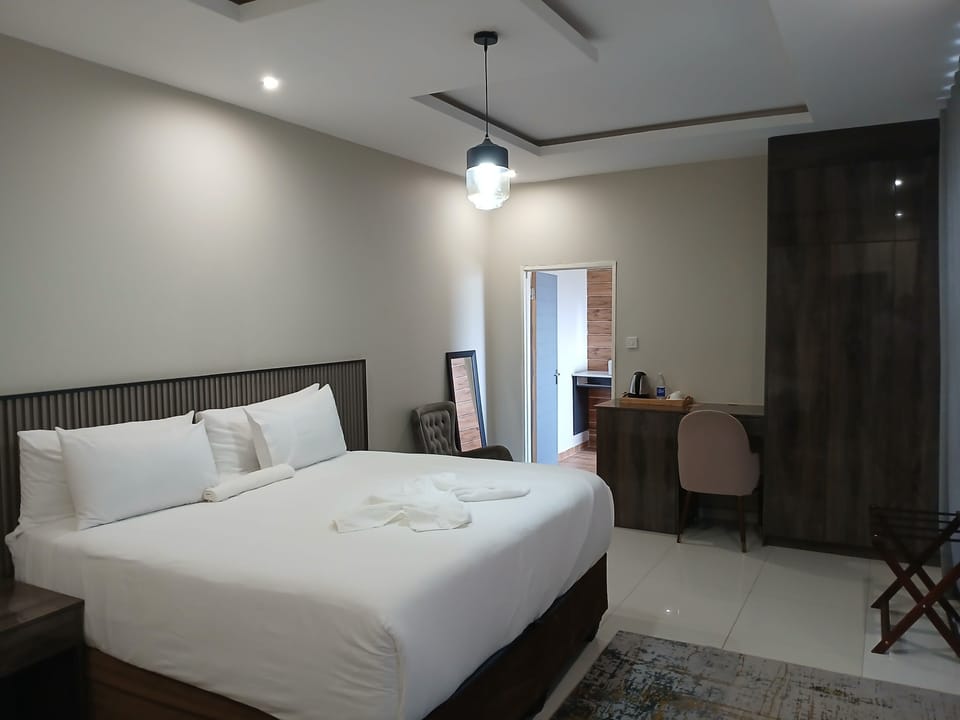 Family Double Room, Pool View | Desk, laptop workspace, iron/ironing board, WiFi (free)