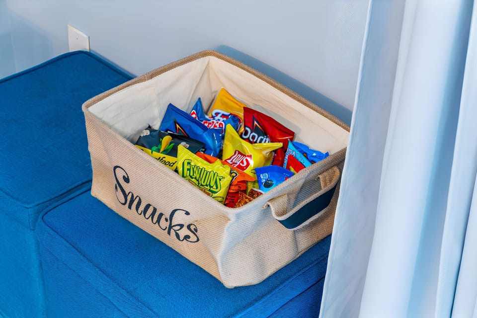 Enjoy a complimentary selection of snacks — perfect for a quick bite or late-night cravings during your stay!