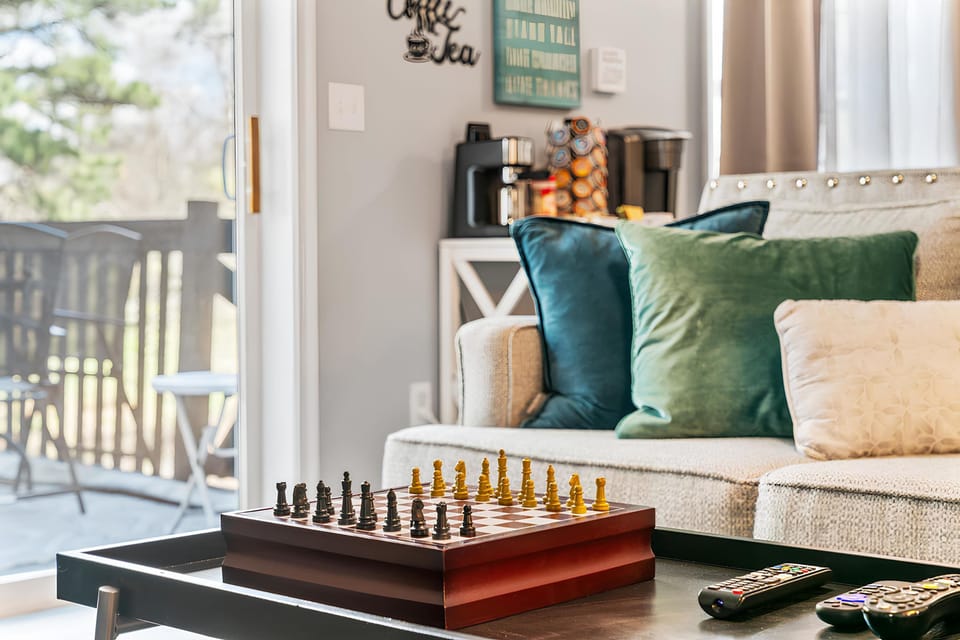 Enjoy game nights and relaxation in our cozy, welcoming living room.