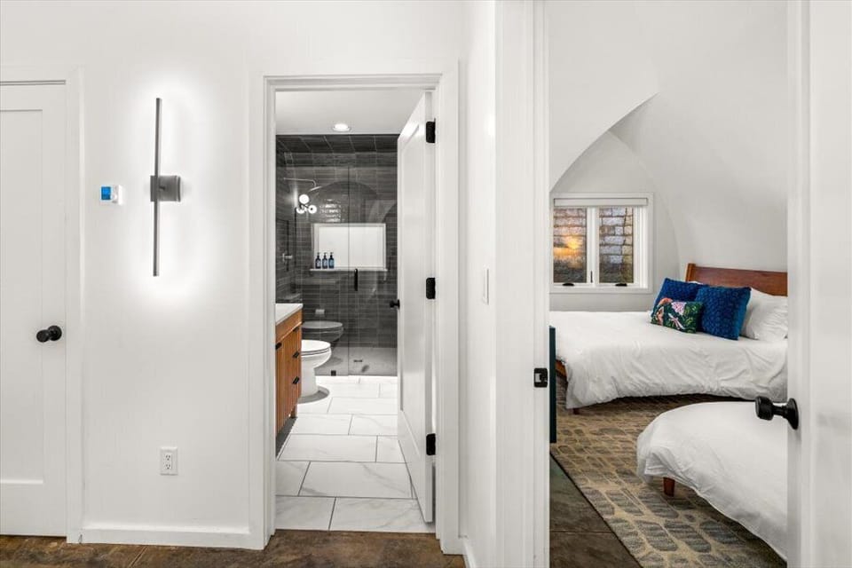 Bathroom located outside bedroom door