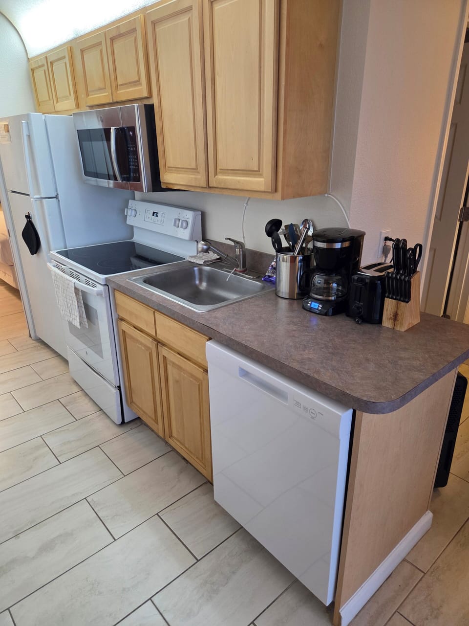 dishwasher and full sink make clean up simple