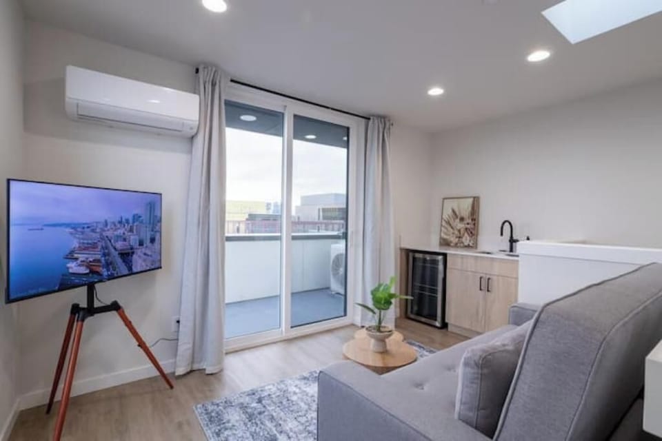 Versatile flex area with scenic balcony views of the Rainier Mountains