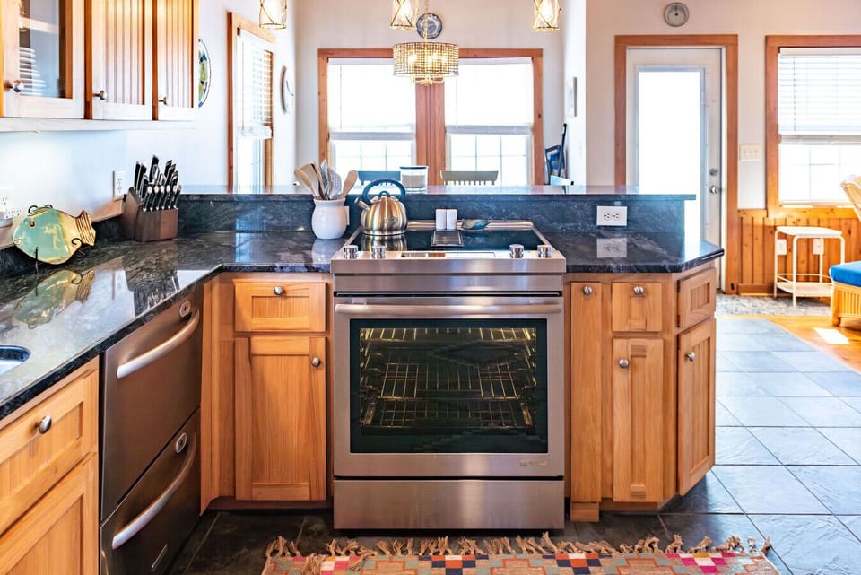 Fully equipped kitchen with modern appliances and spacious countertops—perfect for cooking and entertaining during your stay