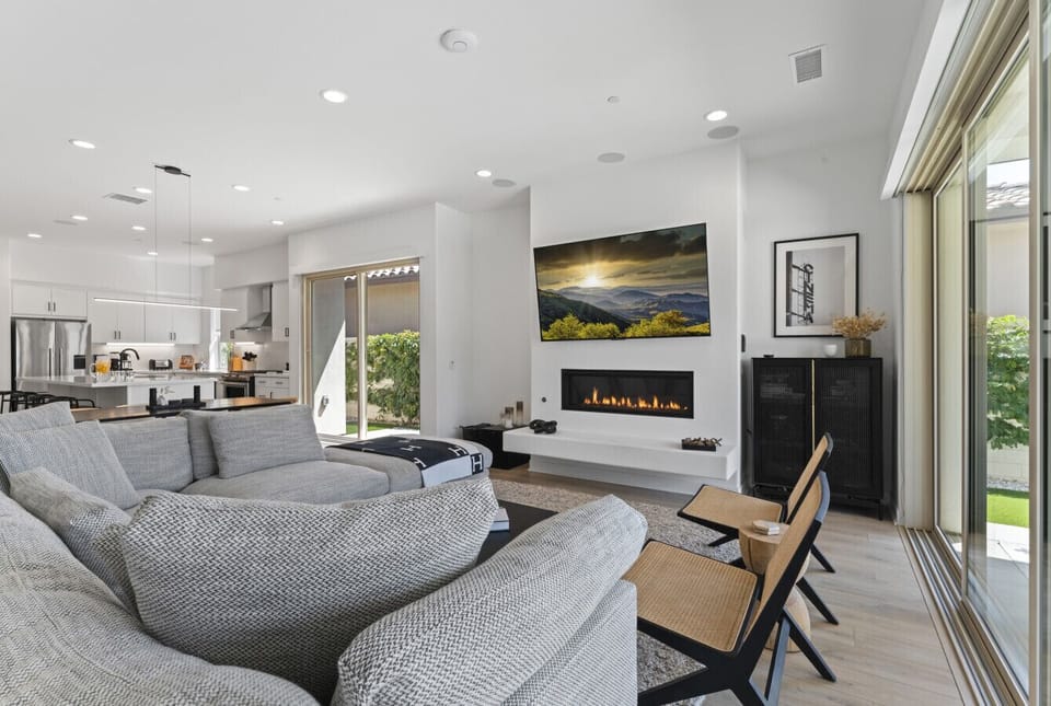 Spacious open living room with abundant natural light.