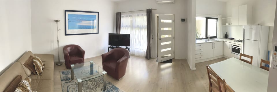 Standard Apartment, 1 Bedroom | Living area | Flat-screen TV
