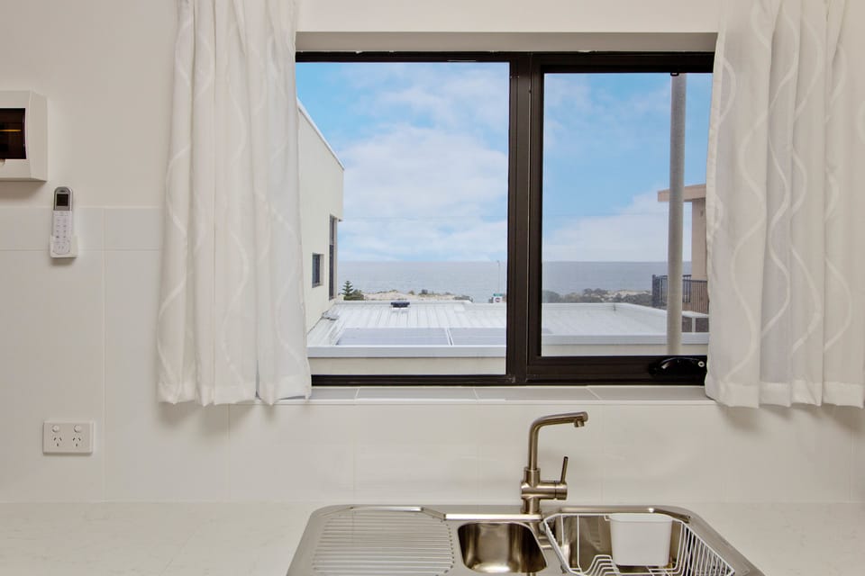 Apartment, 2 Bedrooms | Private kitchen | Full-size fridge, microwave, stovetop, coffee/tea maker