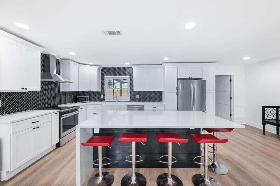 High end kitchen with all the comforts of home.