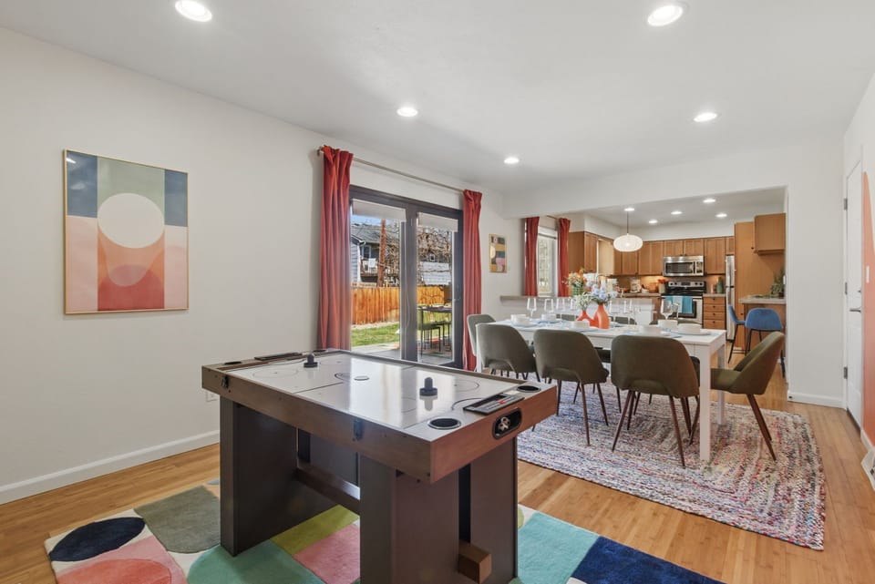 Enjoy a game of air hockey just steps away from the dining area 