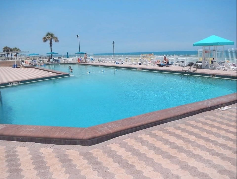 Huge year around heated pool 
