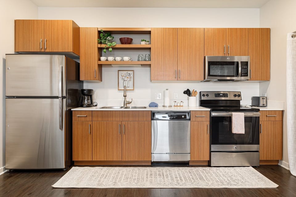 Cook with ease in the full kitchen w/ stainless steel appliances & ample cabinet space.